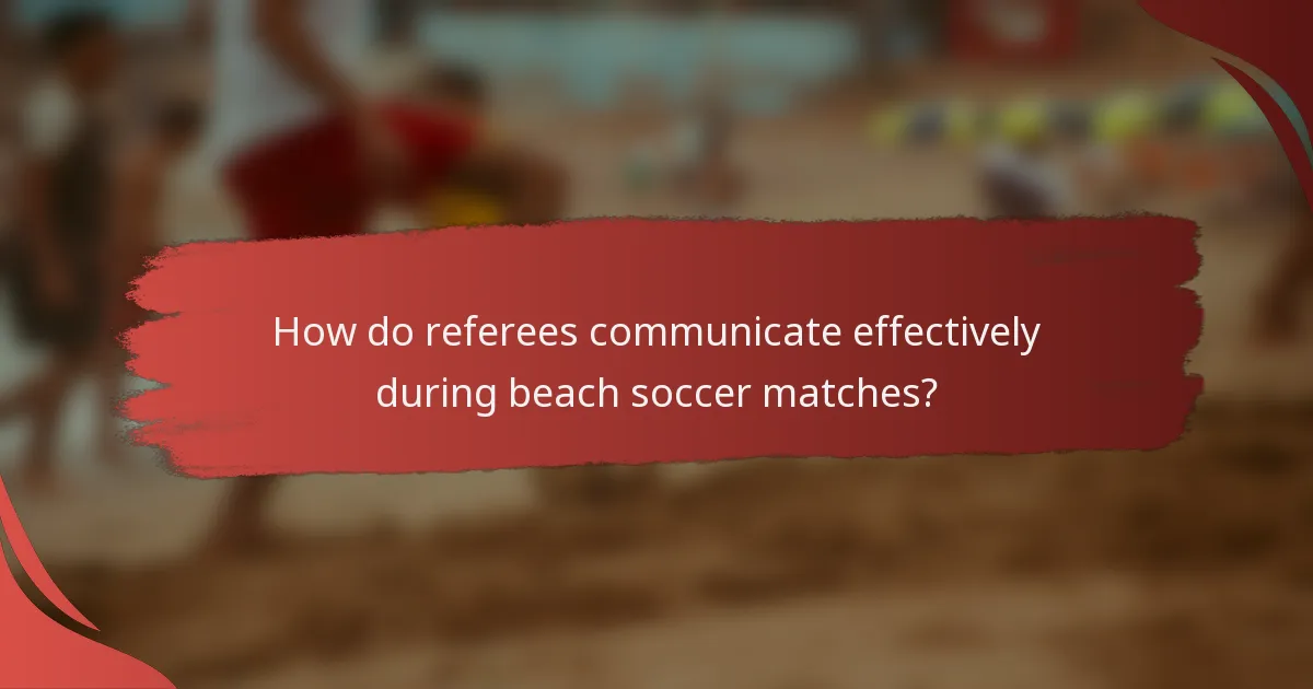 How do referees communicate effectively during beach soccer matches?